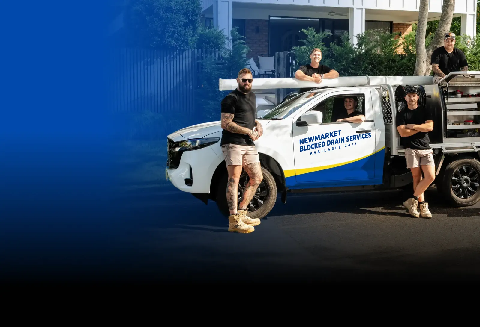 Newmarket Blocked Drain Services team with the ute